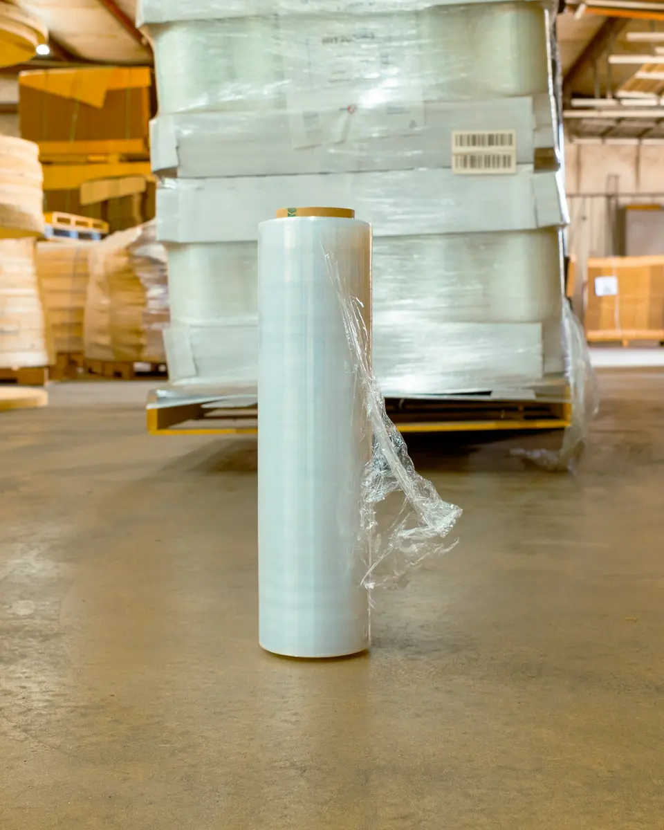 Rolls of hand stretch film on the warehouse floor