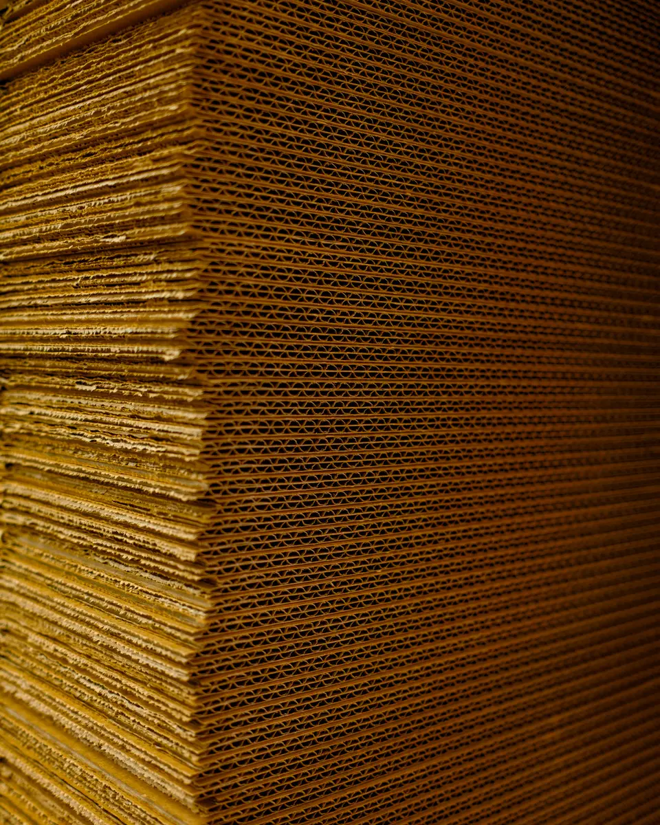 Corrugated sheets and layer pads stacked to size